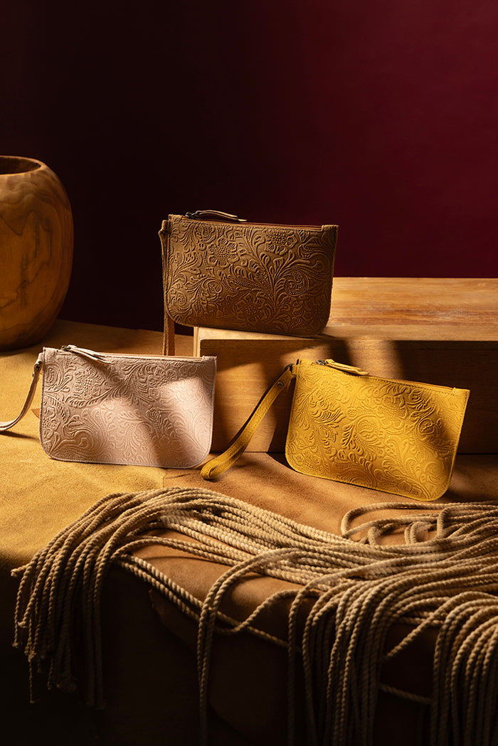 Heritage Scroll Clutch Bag In Beige