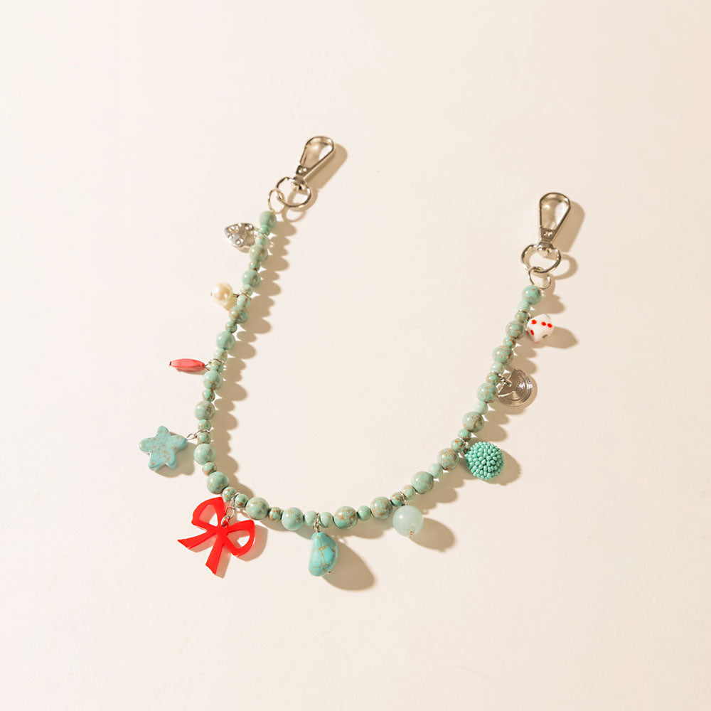 Nina’s Lucky Bag Charm in Ocean Blue