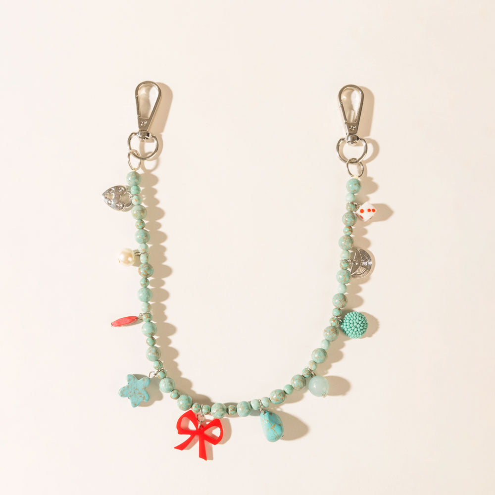 Nina’s Lucky Bag Charm in Ocean Blue