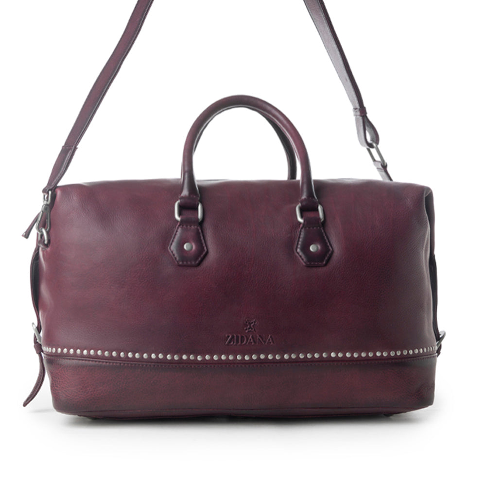 Myra Zidana Sundown Plains Veg Tanned Leather Traveller Bag in Dusty Berry
