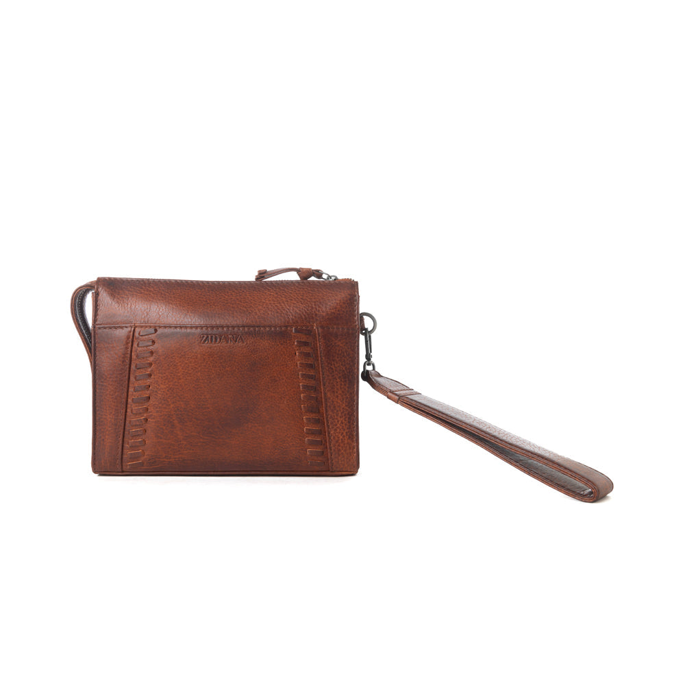 Myra Zidana Bandera Ridge Veg Tanned Leather Wristlet in Vintage Bourbon