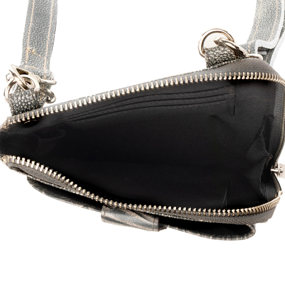 Coyote Bloom Embossed mini sling for Women in sage with floral detail