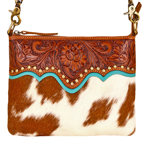 Latigo Crossbody Bag for Women in brown with hair on and handtooled leather