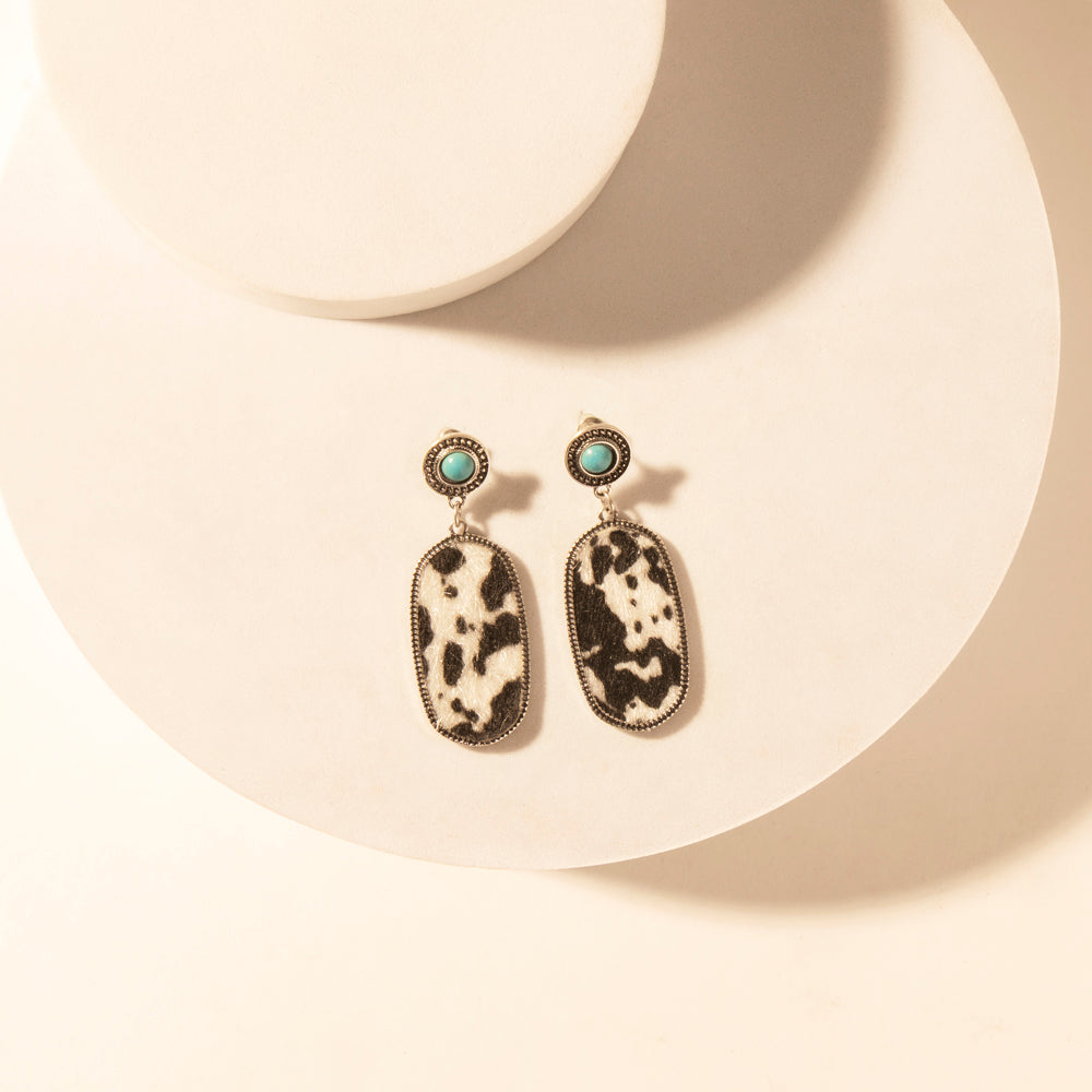 Wild Hide Dangle Earrings for Women with turquoise and cowhide print detail for premium western wear