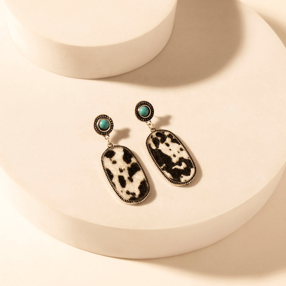 Wild Hide Dangle Earrings for Women with turquoise and cowhide print detail for premium western wear