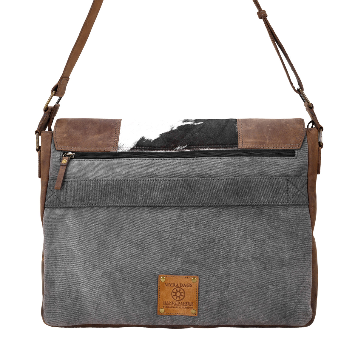 Nightherd Laptop Bag in brown with hair on and turn lock