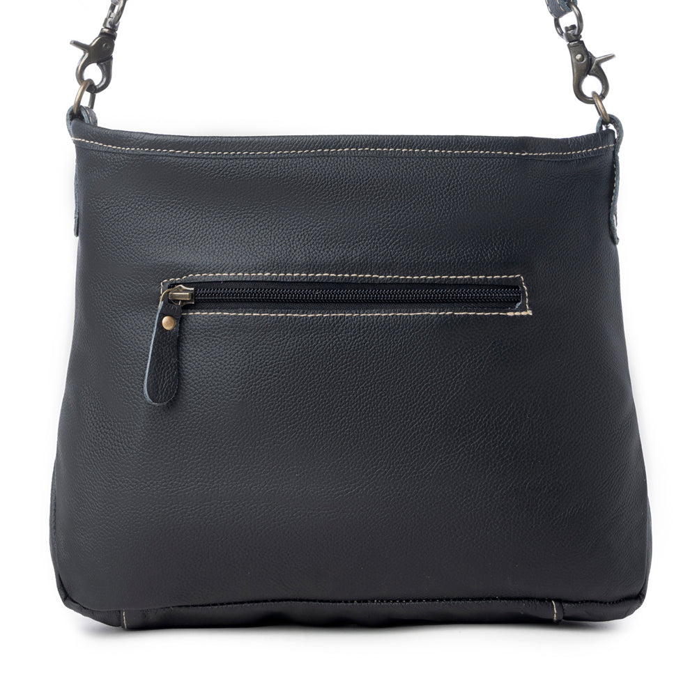 ANTIQUATED LEATHER AND HAIRON BAG