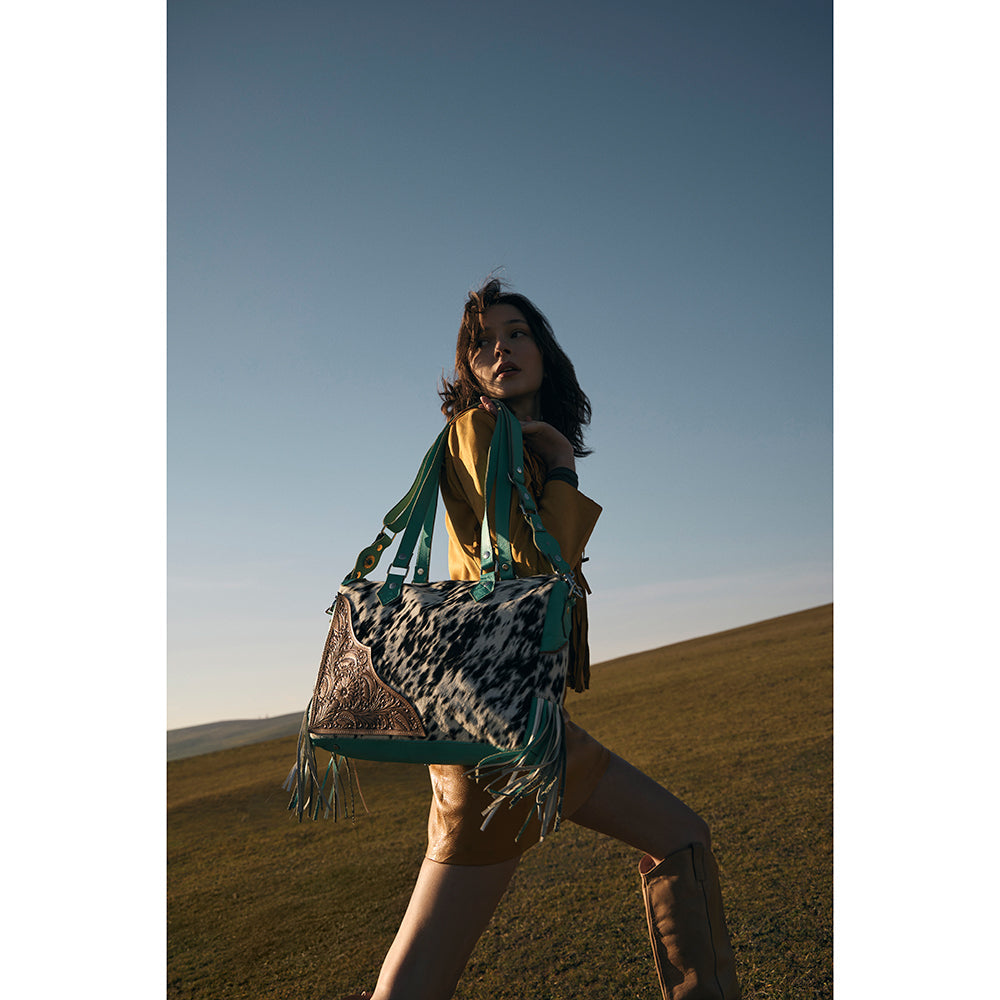 Rimrock Concealed-Carry Bag for Women in turquoise with suede fringe