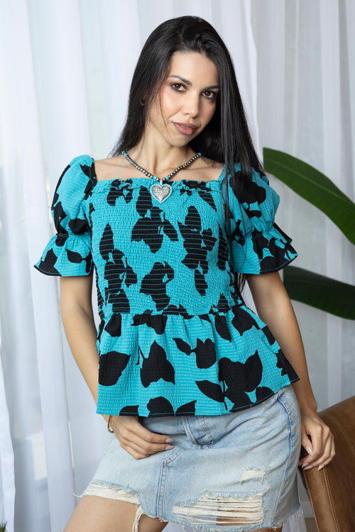 Bailey in Bold Peplum Top In Blue and Black