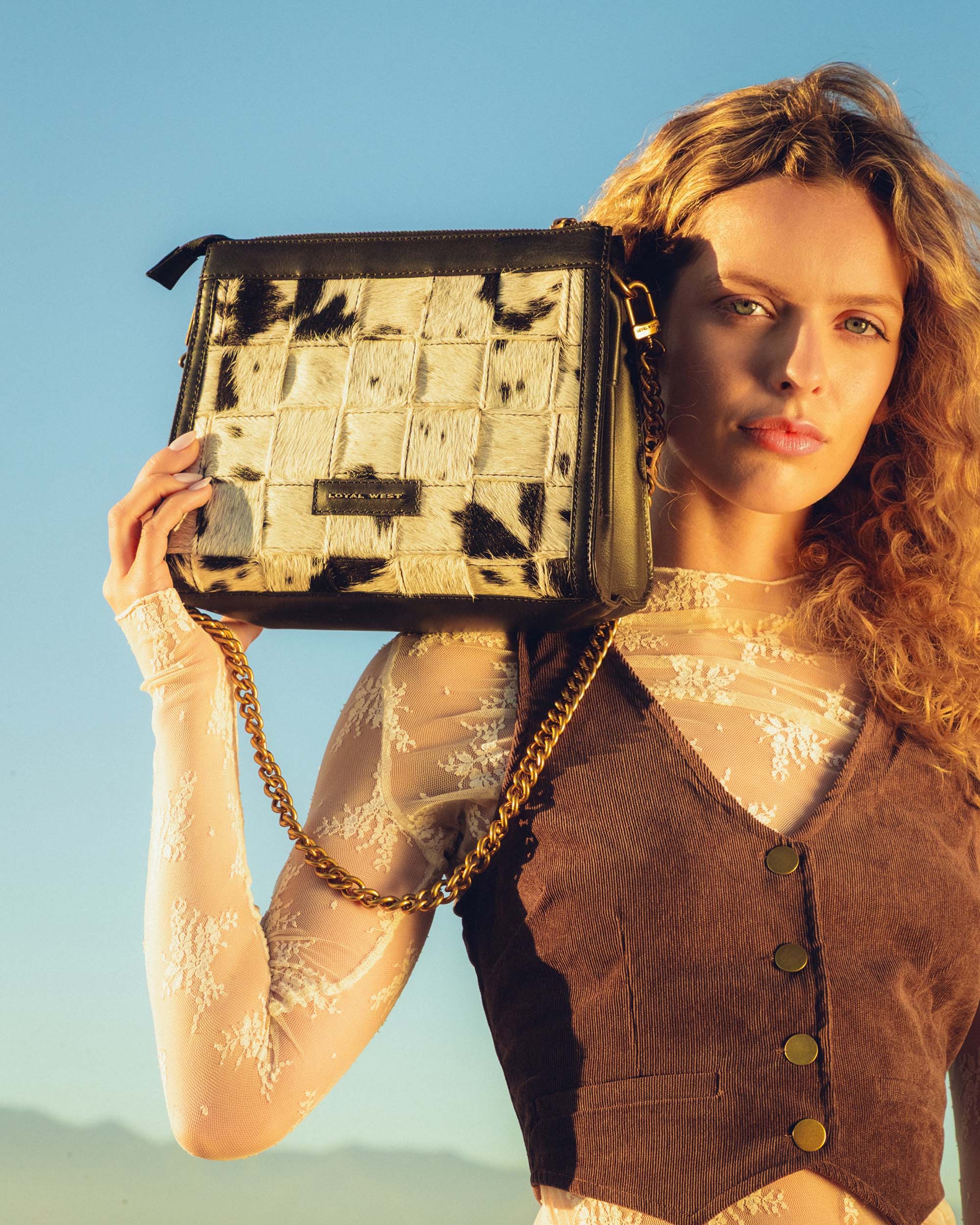 LOYAL WEST SCRAPPY MEDIUM CHAIN BAG IN COWHIDE AND BLACK CALFSKIN