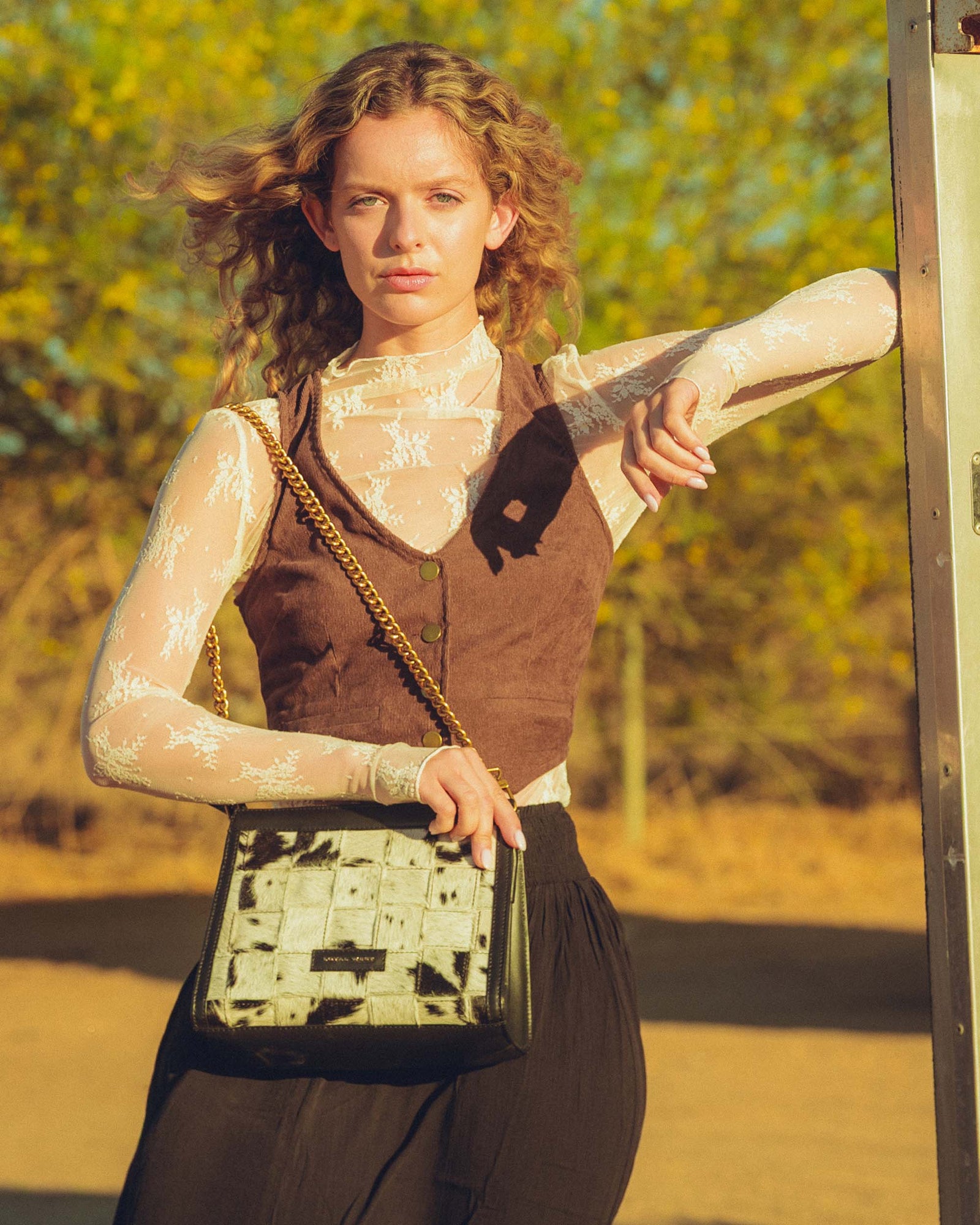 LOYAL WEST SCRAPPY MEDIUM CHAIN BAG IN COWHIDE AND BLACK CALFSKIN