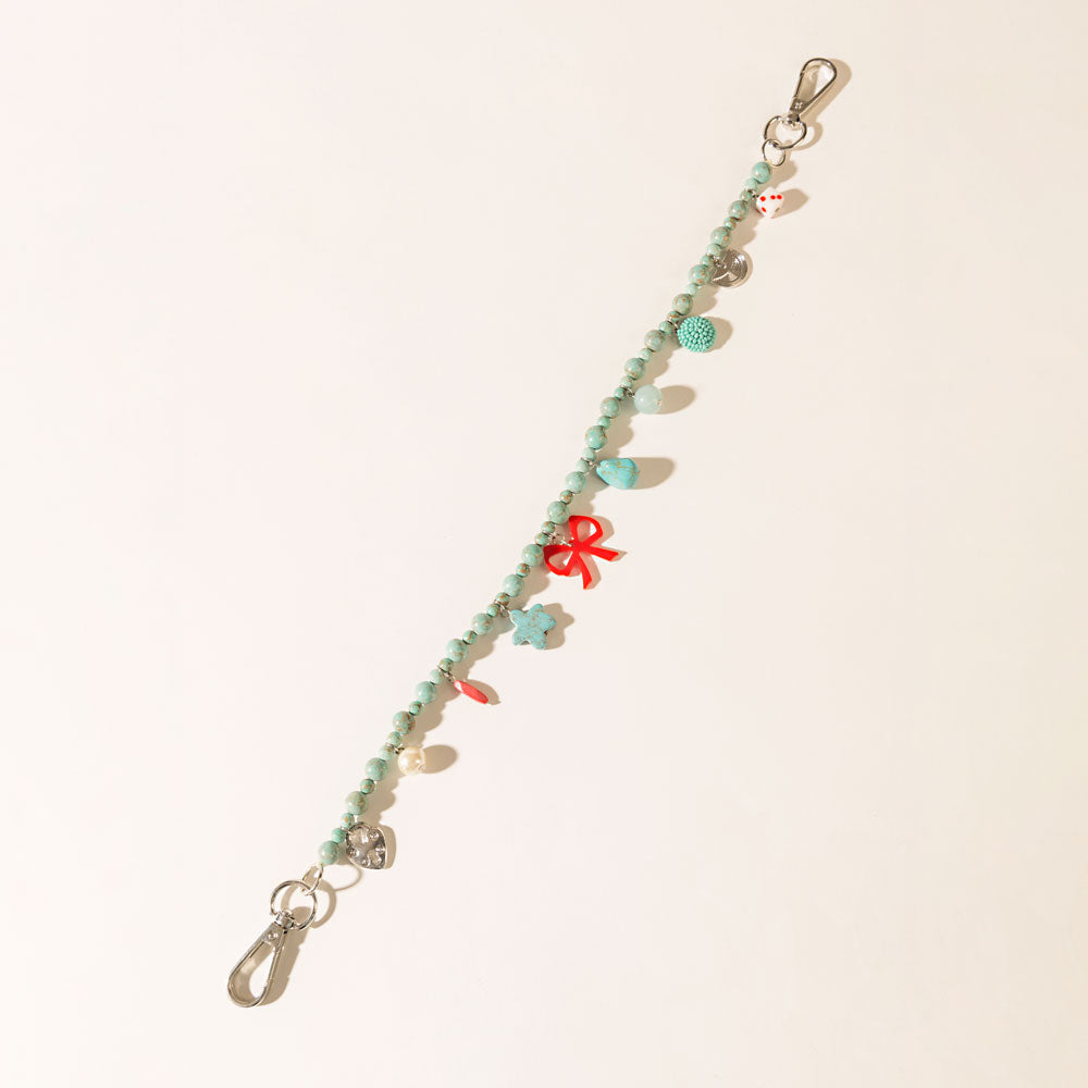 Nina’s Lucky Bag Charm in Ocean Blue