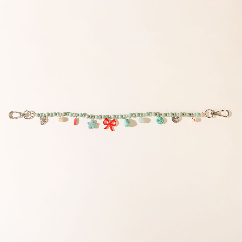 Nina’s Lucky Bag Charm in Ocean Blue