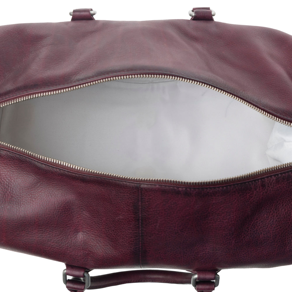 Myra Zidana Sundown Plains Veg Tanned Leather Traveller Bag in Dusty Berry