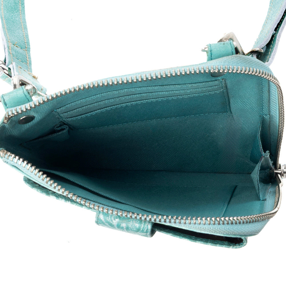 Coyote Bloom Embossed mini sling for Women in aqua with floral detail