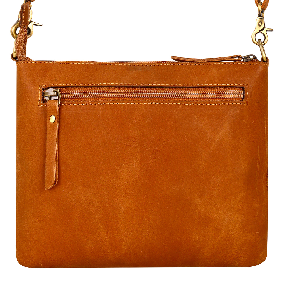 Latigo Crossbody Bag for Women in brown with hair on and handtooled leather