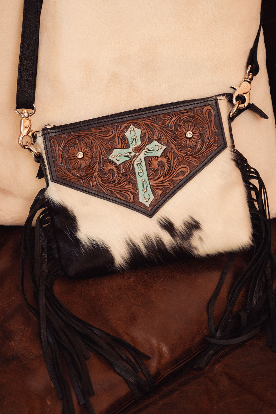 Shalom Crossbody Bag for Women in black with hair on and handtooled cross