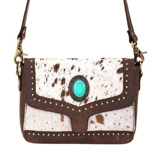 Dustridge Crossbody Bag for Women in brown with hair on, studs and turquoise concho