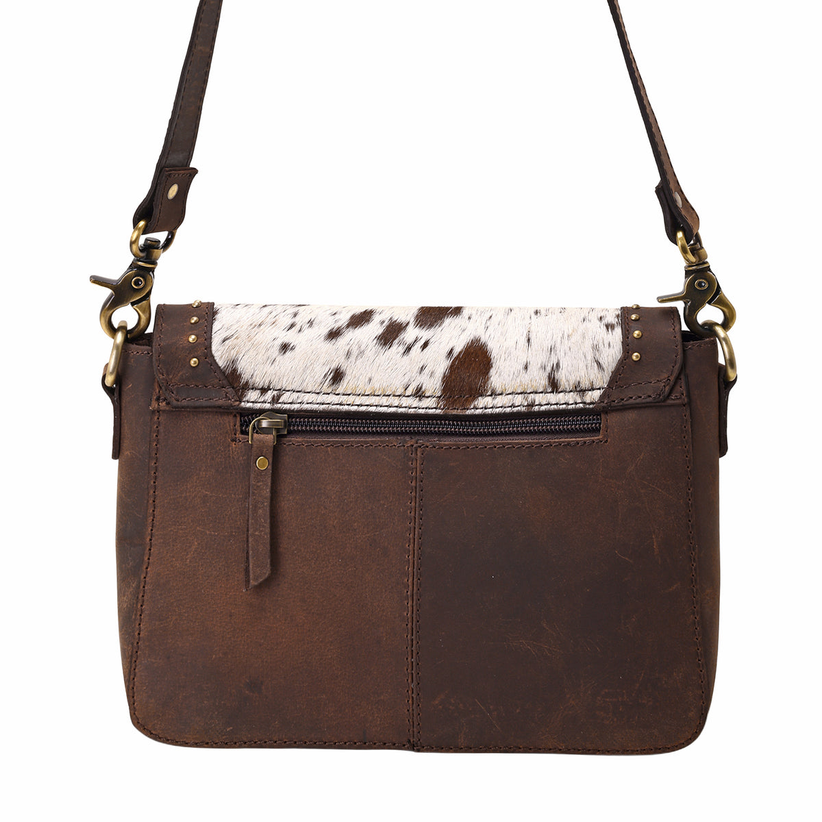 Dustridge Crossbody Bag for Women in brown with hair on, studs and turquoise concho