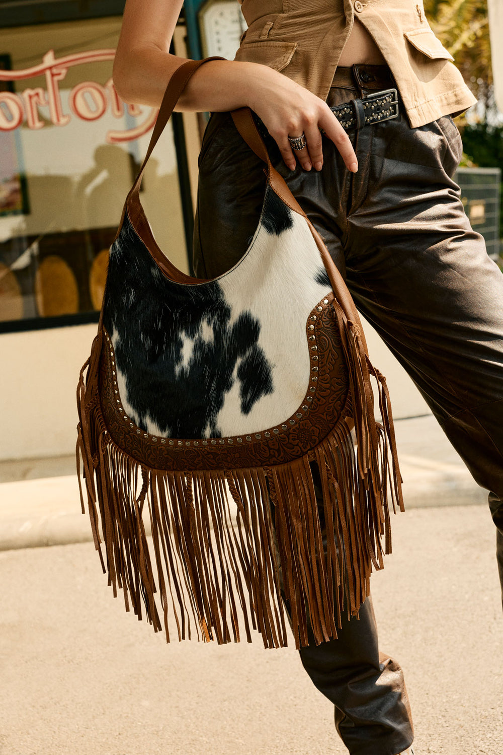 Lasso Lane Hairon Leather Bag for Women in brown with fringe and embossed detail