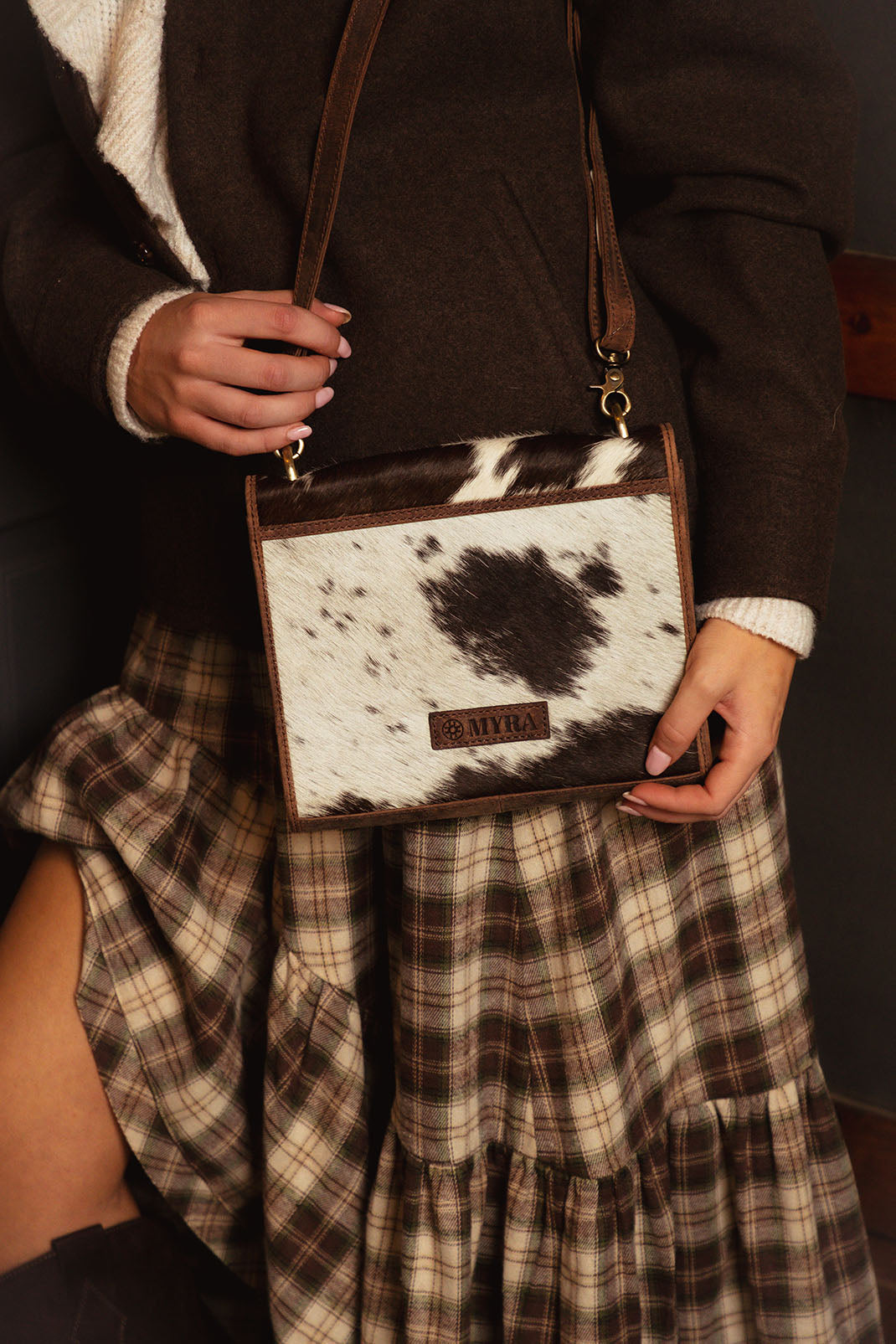 Hollowbend Crossbody Bag for Women in Black and white with hair on and leather strap