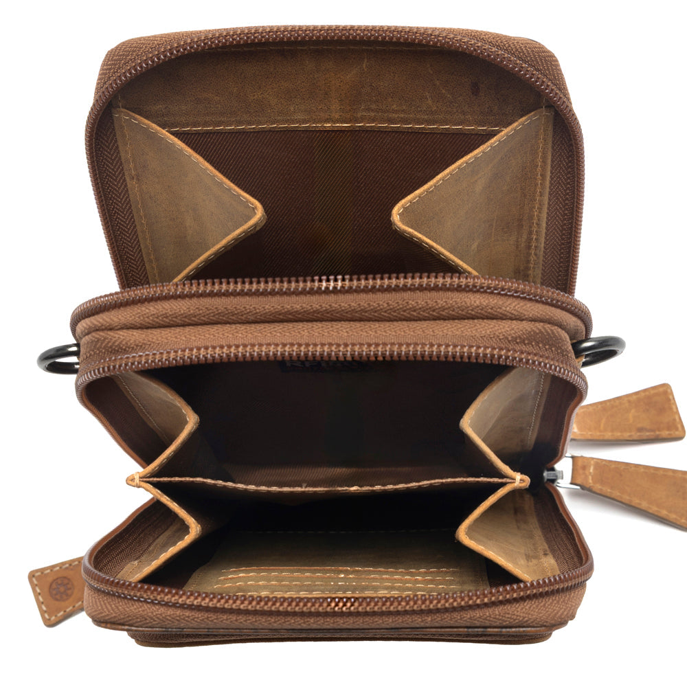 Rustler Ridge Embossed Leather Hairon Sling Bag in Sandstone Cream