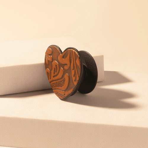 Cowgirl Heart Phone Socket for Women in brown with handtooled detail for everyday use