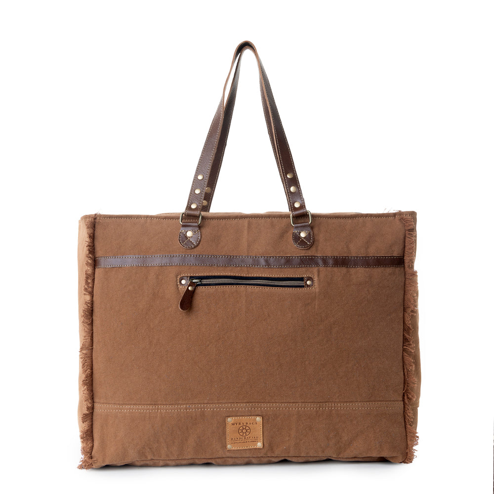 Forester Junction Weekender Bag in tan with hair on and embossed leather