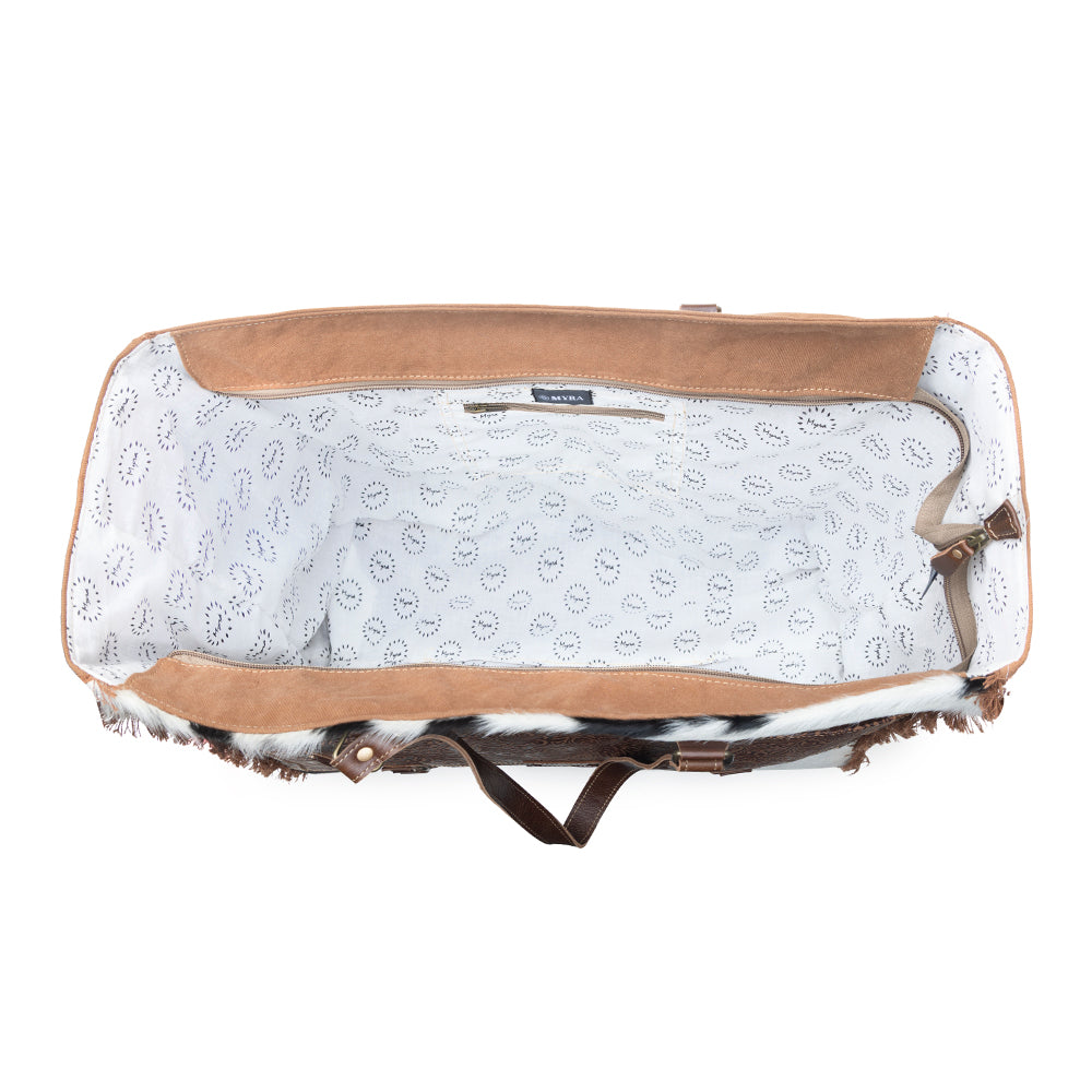 Forester Junction Weekender Bag in tan with hair on and embossed leather