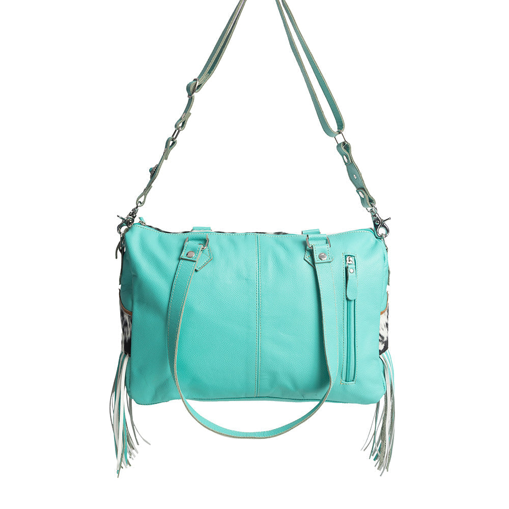 Rimrock Concealed-Carry Bag for Women in turquoise with suede fringe