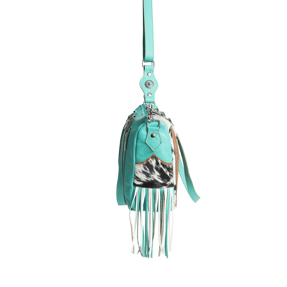Rimrock Concealed-Carry Bag for Women in turquoise with suede fringe